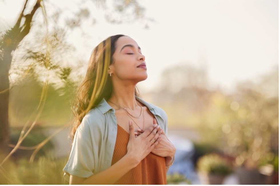 woman practicing mindful breathing