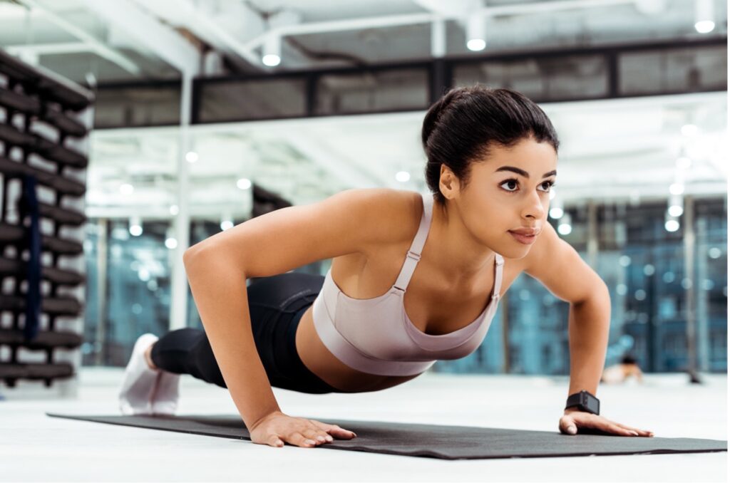 woman working out doing push ups